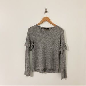 Soft grey sweater with ruffles